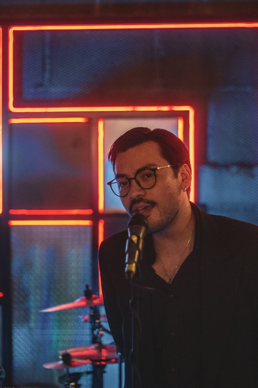 singer performing on stage