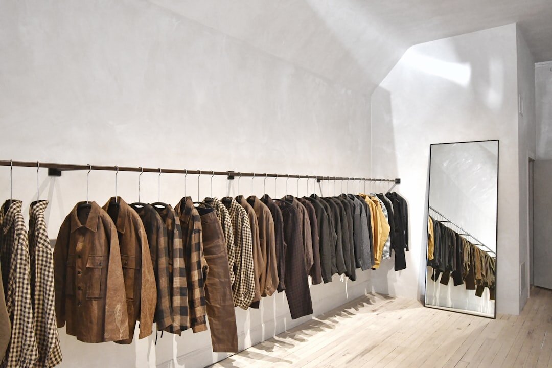 Rack of curated designer garments in a fashion archive