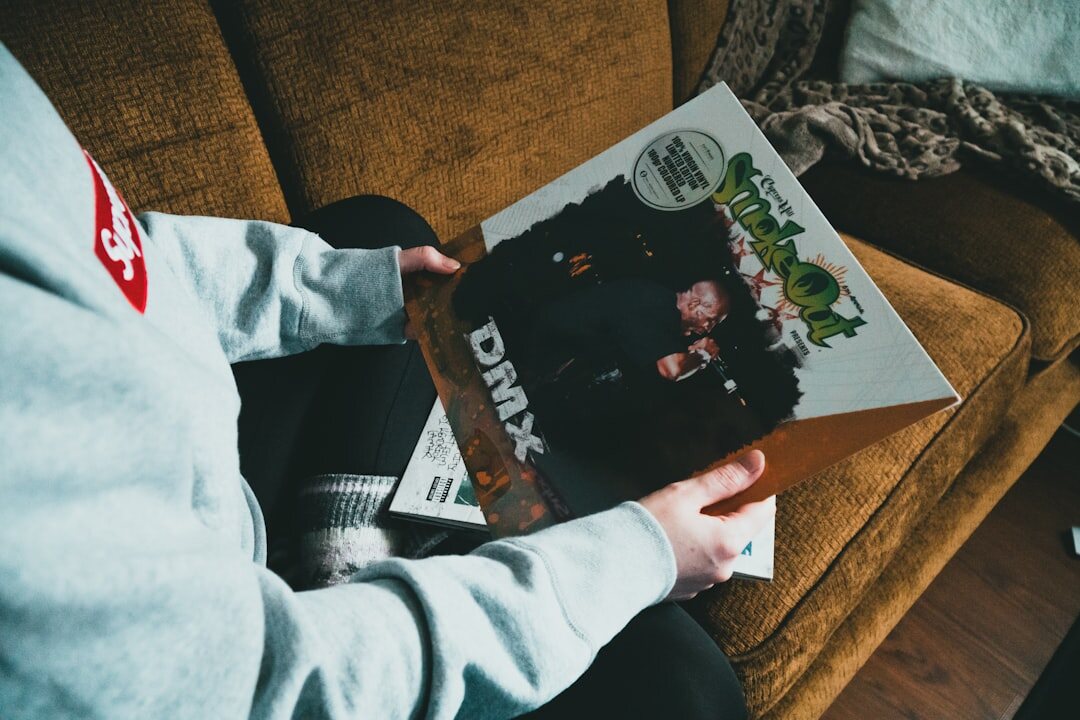 person reading old magazine