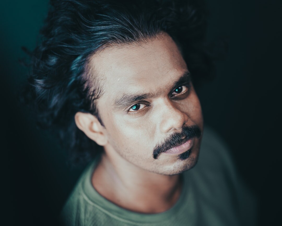 Studio portrait of a distinguished European actor in a tailored suit